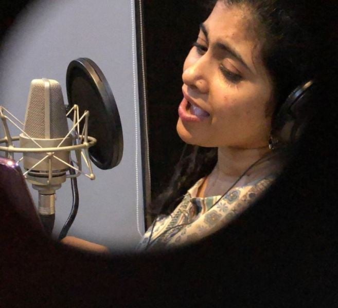 Kajal Seelamsetty while singing a song on Radio FM