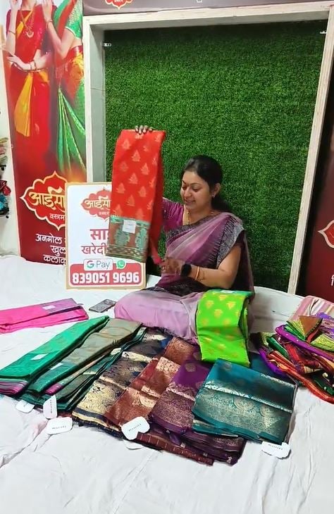 Kalyani Powar selling sarees at her store