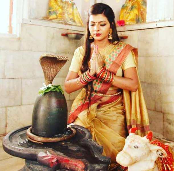 Kanak Yadav praying to Lord Shiva