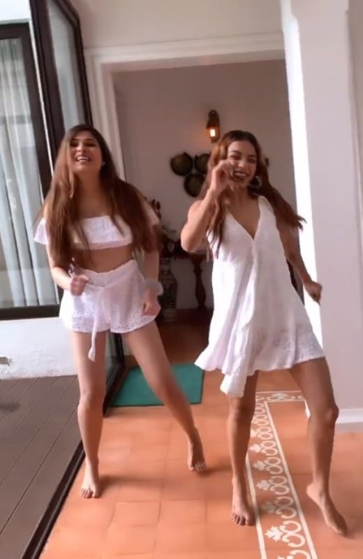 Kanan Sharma (left) while dacing on a song