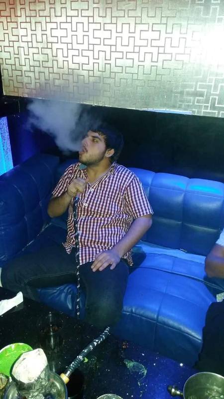 Kapil Sangwan smoking Hookah