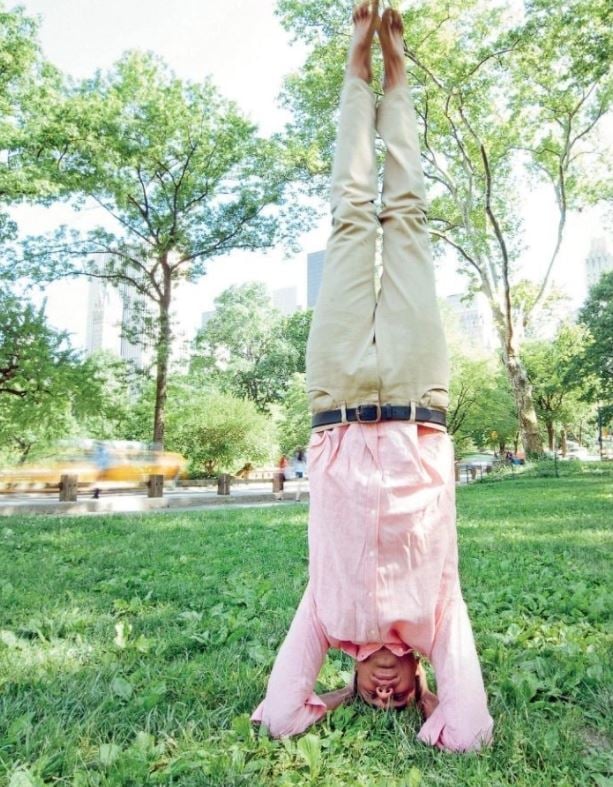 Karan Bajaj performing headstand