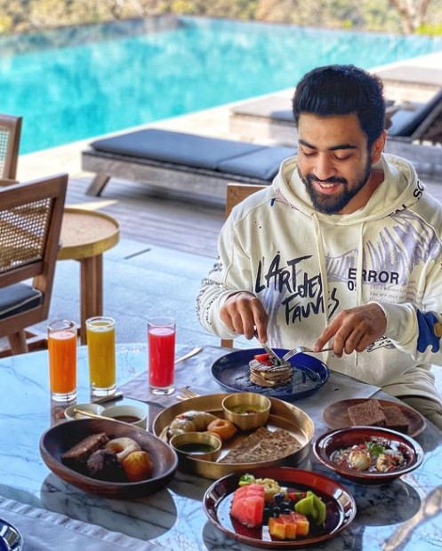 Karan Sehgal while posing for a food vlog