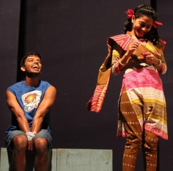 Karan Sonawane (left) in a still from a theatre play