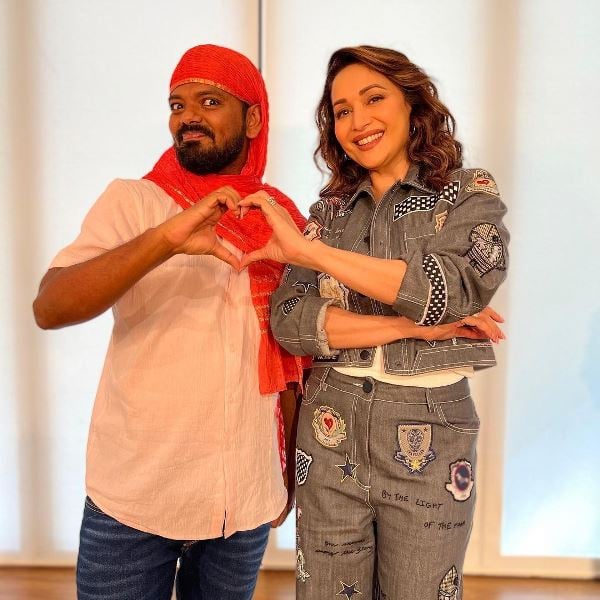 Karan Sonawane (left) with Madhuri Dixit