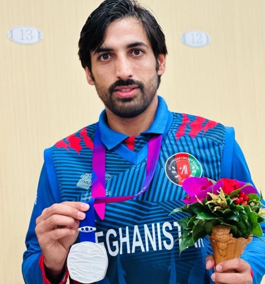 Karim Janat after winning the silver medal in the 19th Asian Games
