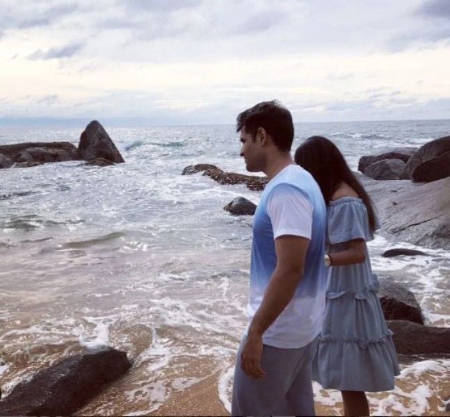 Karma Vivan while travelling with his wife