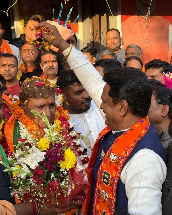 Karnail Singh being welcomed with garlands after winning the election from his constituency