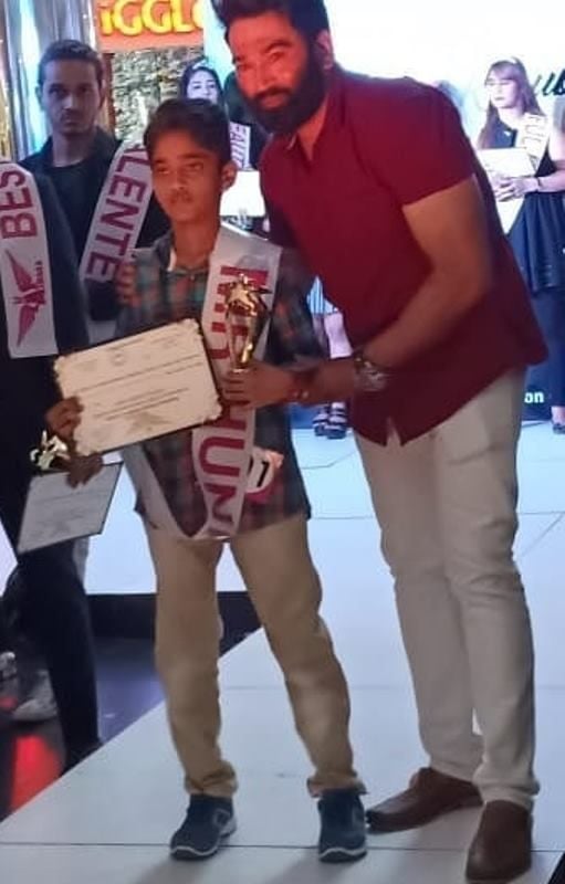 Karthikeya Dev after winning the title of 