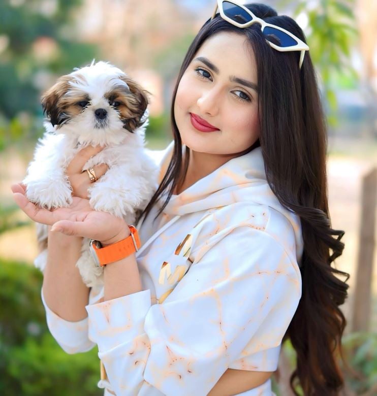 Kashish Aggarwal with a dog