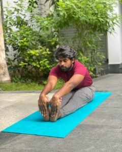Kathir practising Yoga