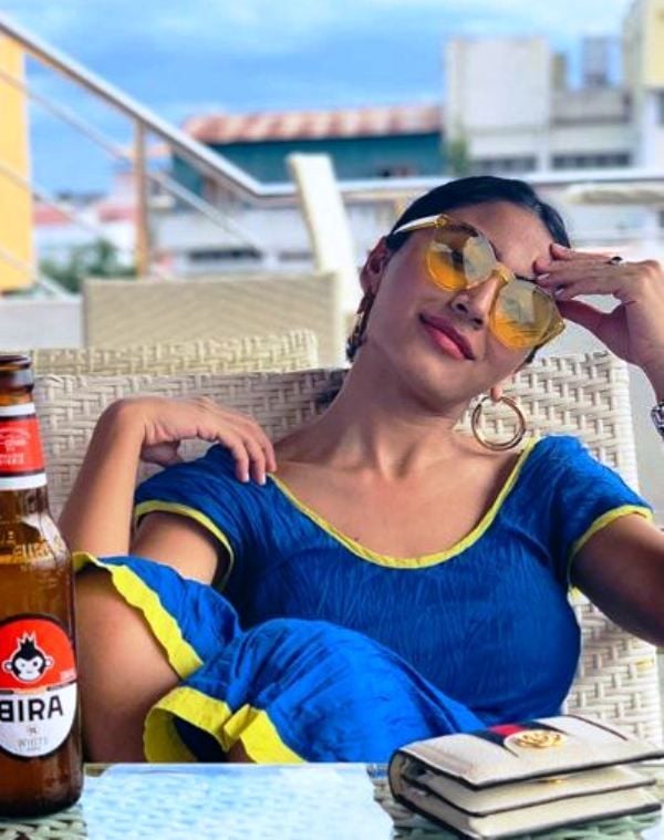 Katie Iqbal in a Restaurant