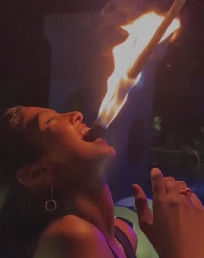 Keerthi Pandian while demonstrating her fire eating skills