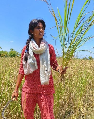 Keerthi Pandian while farming in her fields