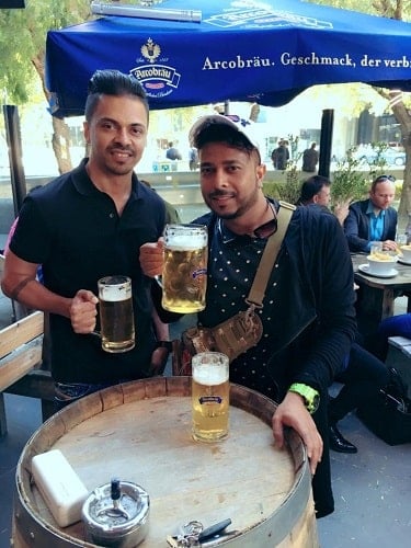 Ken Ferns drinking beer with his friend