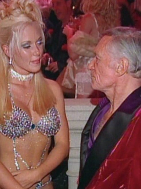 Kendra Wilkinson with Hugh Hefner at his 78th birthday party in April 2004