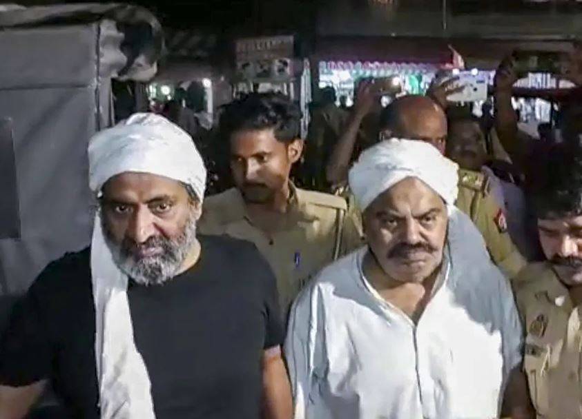 Ashraf Ahmed with his brother Atiq Ahmed going for a medical check, a few seconds before both were murdered