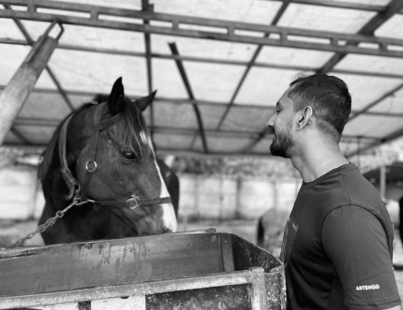 Khalid Rahman with a horse