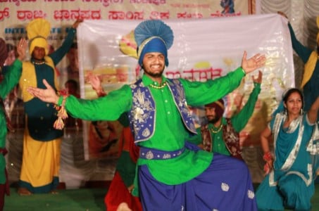 Khushi Pandher dancing during a bhangra competition