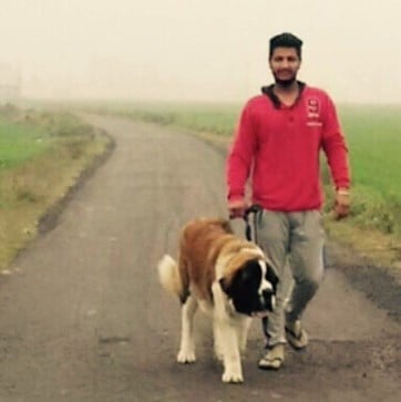 Khushi Pandher with his pet dog