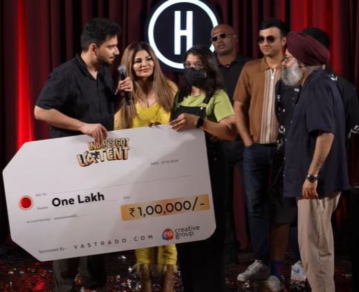 Khushi Saini (in mask) after winning India