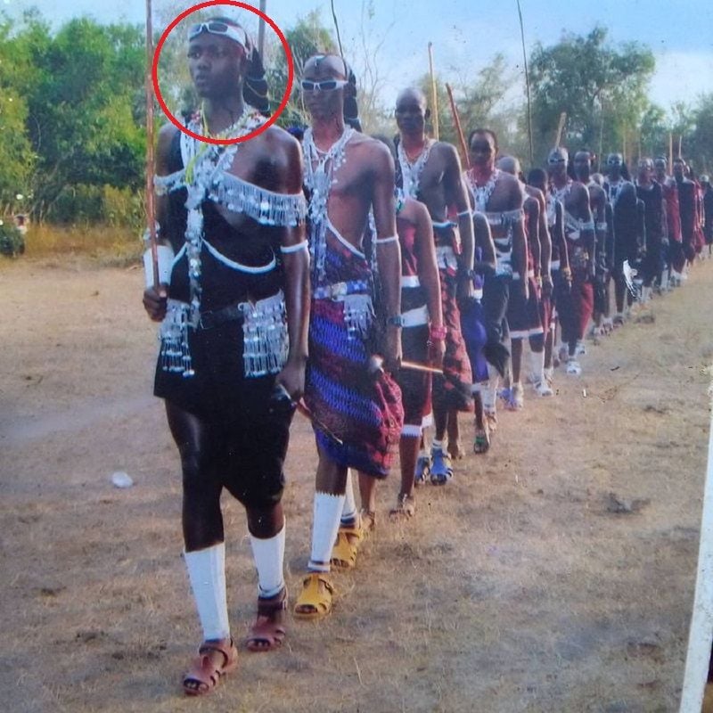 Kili Paul posing as a Maasai warrior