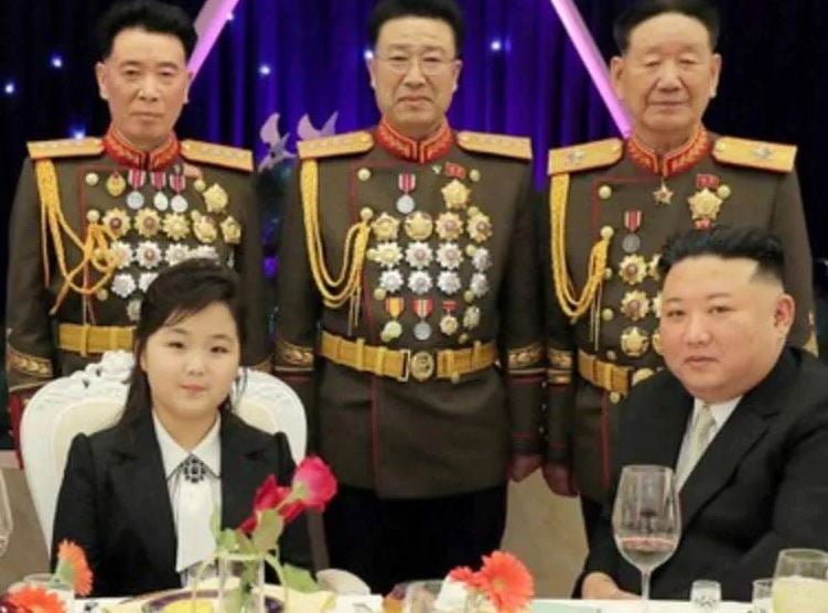 Kim Ju Ae during an official dinner with her father and other Army officials