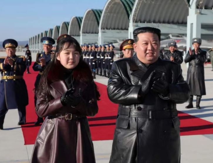 Kim Ju Ae during an official dinner with her father and other Army officials