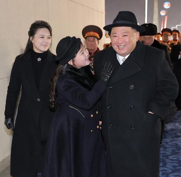 Kim Ju Ae with her parents at a military parade