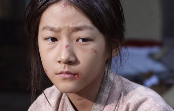 Kim Sae-ron in a still from the film Manshin Ten Thousand Spirits