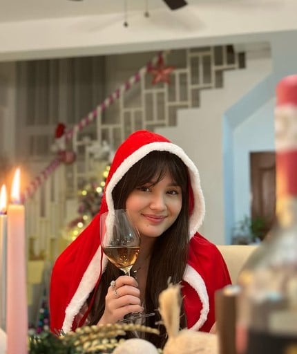 Kira Balinger while enjoying wine