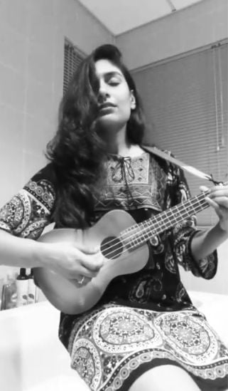 Kira Narayanan playing the Ukelele
