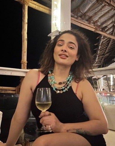 Kiran Rathod drinking wine