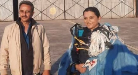 Kirti Vardhan Singh and Shital Mahajan posing after a parachute jump at Pinjore Airport in Haryana