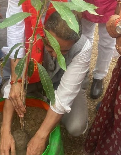 Kirti Vardhan Singh while planting a sapling