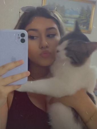 Krisa Caushi with her cat