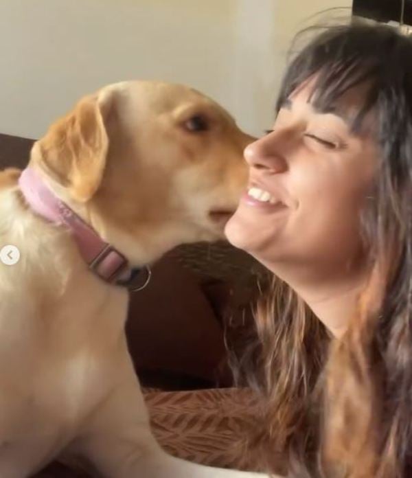 Krishna Bhatt with her dog