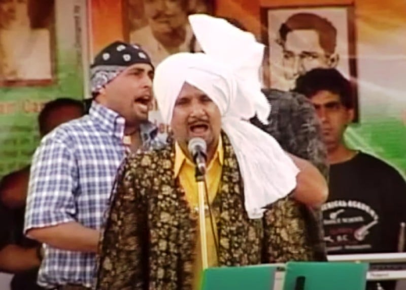 Kuldeep Manak performing at Gadri Babe Da Mela held in Surrey, Canada