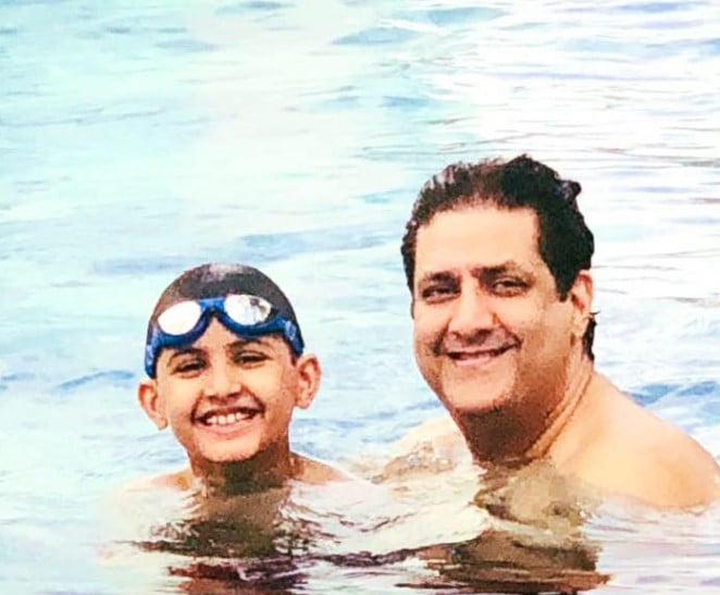 Kunal Goswami while enjoying swimming with his son