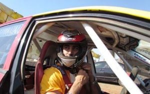 Kunal Kapoor in a ralley racing car