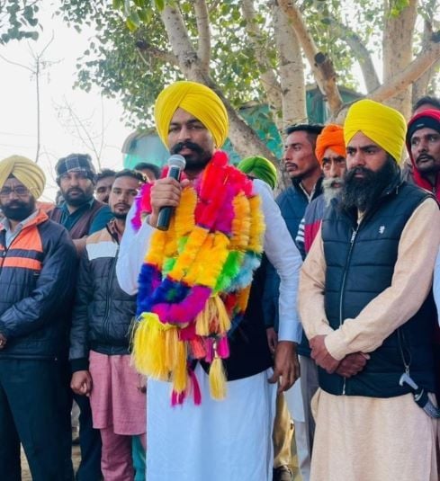 Labh Singh Ugoke speaking during a political rally