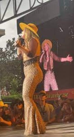 Lainey Wilson in her leopard-print pants in a still from the viral TikTok video