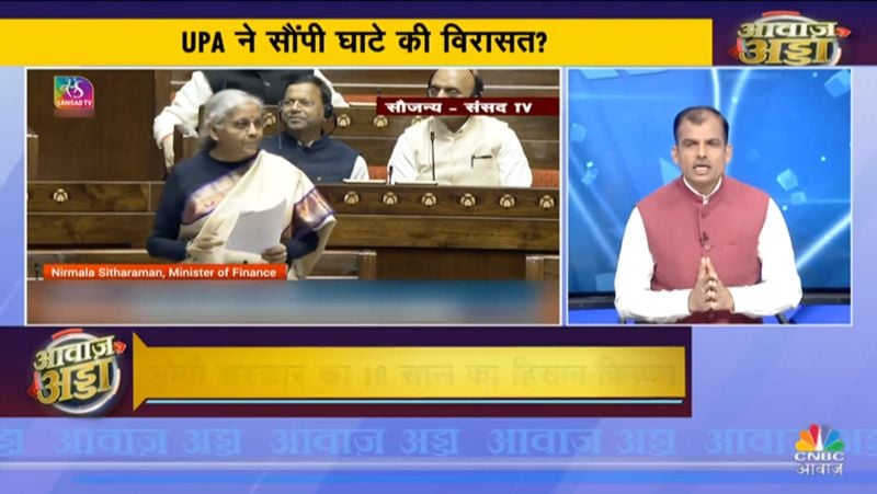 Lakshman Roy (extreme right) in a still from the CNBC Awaaz