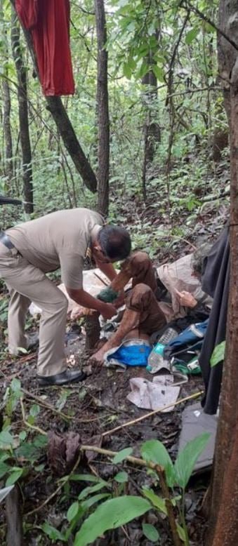 Lalita Kayi being rescued by the police