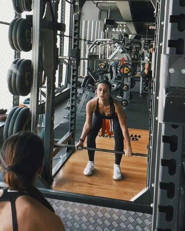 Larissa Bonesi while working out in a gym