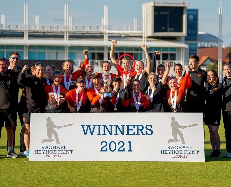 Lauren Bell with her team after winning Rachael Heyhoe Flint Trophy