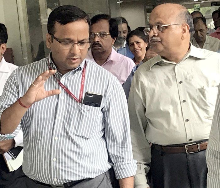 Lav Agarwal interacting with one of his colleagues