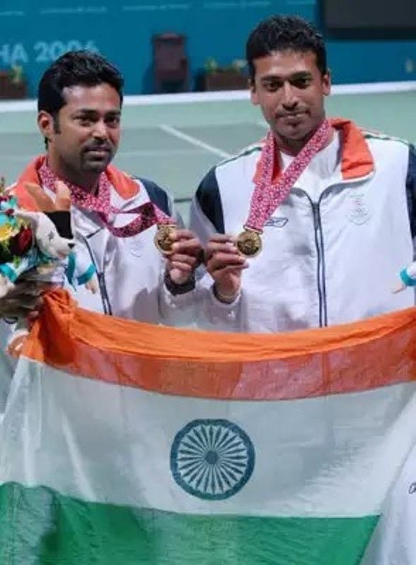 Leander Paes and Mahesh Bhupathi with their gold medals for Men