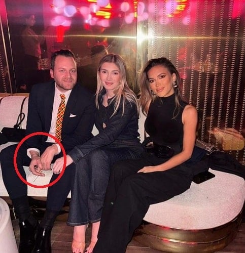 Ledion Liço holding a cigarette