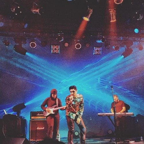 Leo Kalyan performing on stage